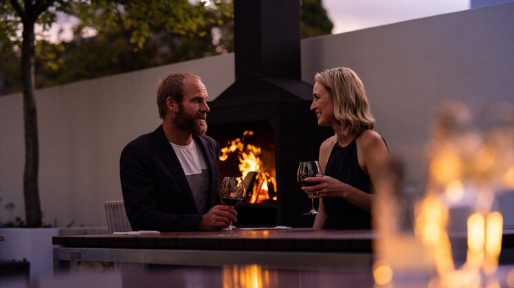 The luxury hotel Christchurch guests love for its elegant alfresco area with outdoor fire.